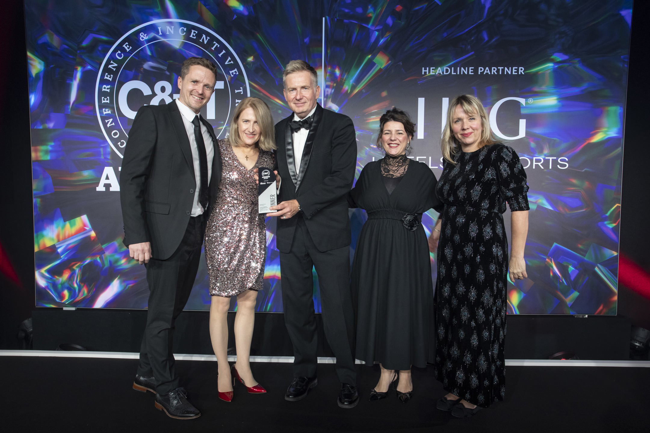 C&IT Awards 2024 Technology and Telecoms Event of the Year photo of team collecting the award Mark Jackson Katie Streten